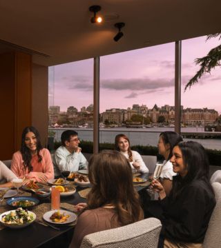 Group dining in Aura Waterfront Restaurant + Patio Cove private dining room