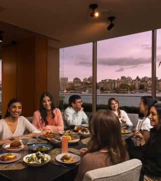 Group dining in Aura Waterfront Restaurant + Patio Cove private dining room